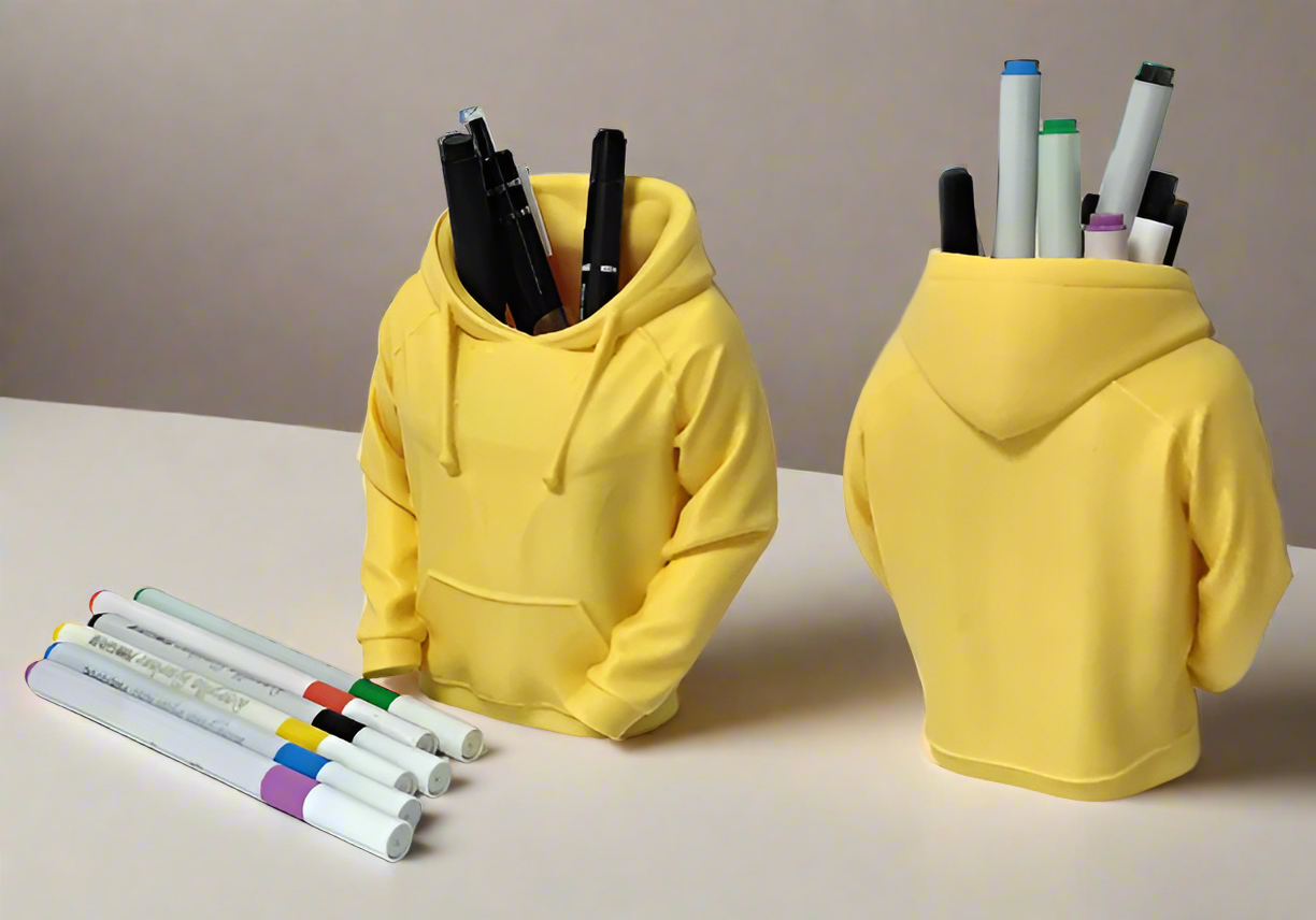 Yellow hoodie-shaped pen holder with markers on a white background