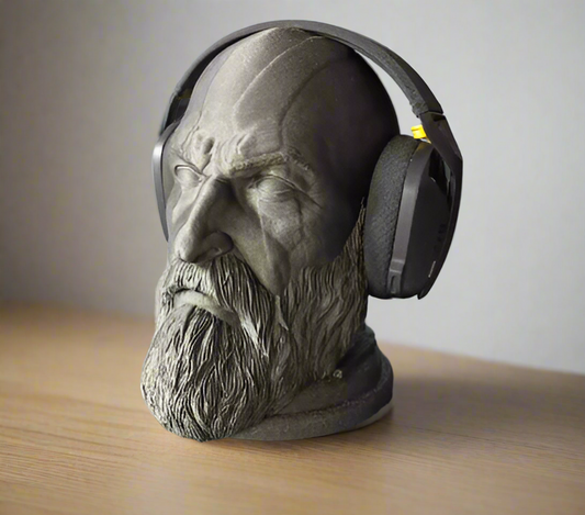 Statue of a bearded man wearing headphones on a reflective surface